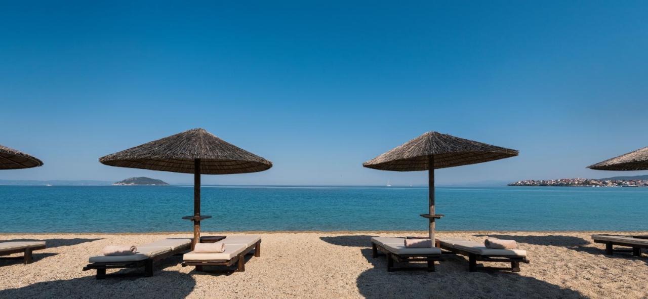 Porto Carras Meliton Hotel Neos Marmaras Exterior photo A beach in Greece