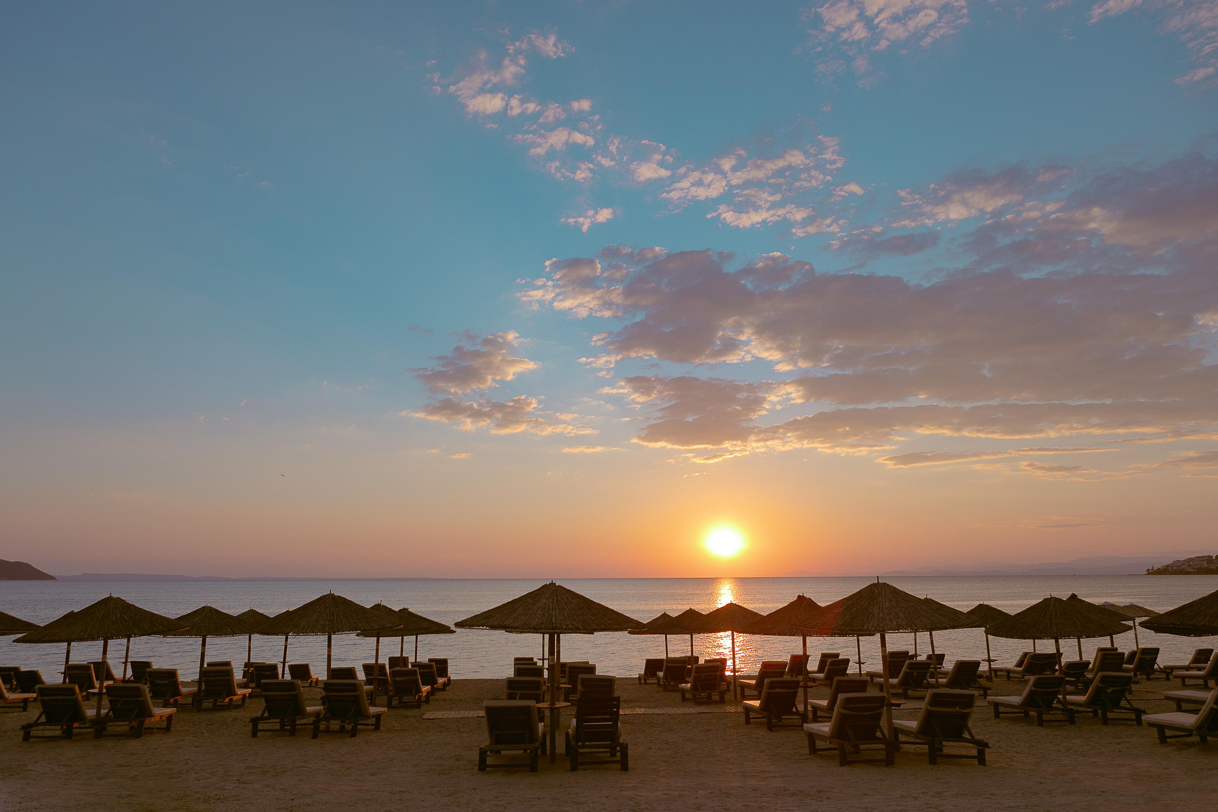 Porto Carras Meliton Hotel Neos Marmaras Exterior photo Sunset at the beach