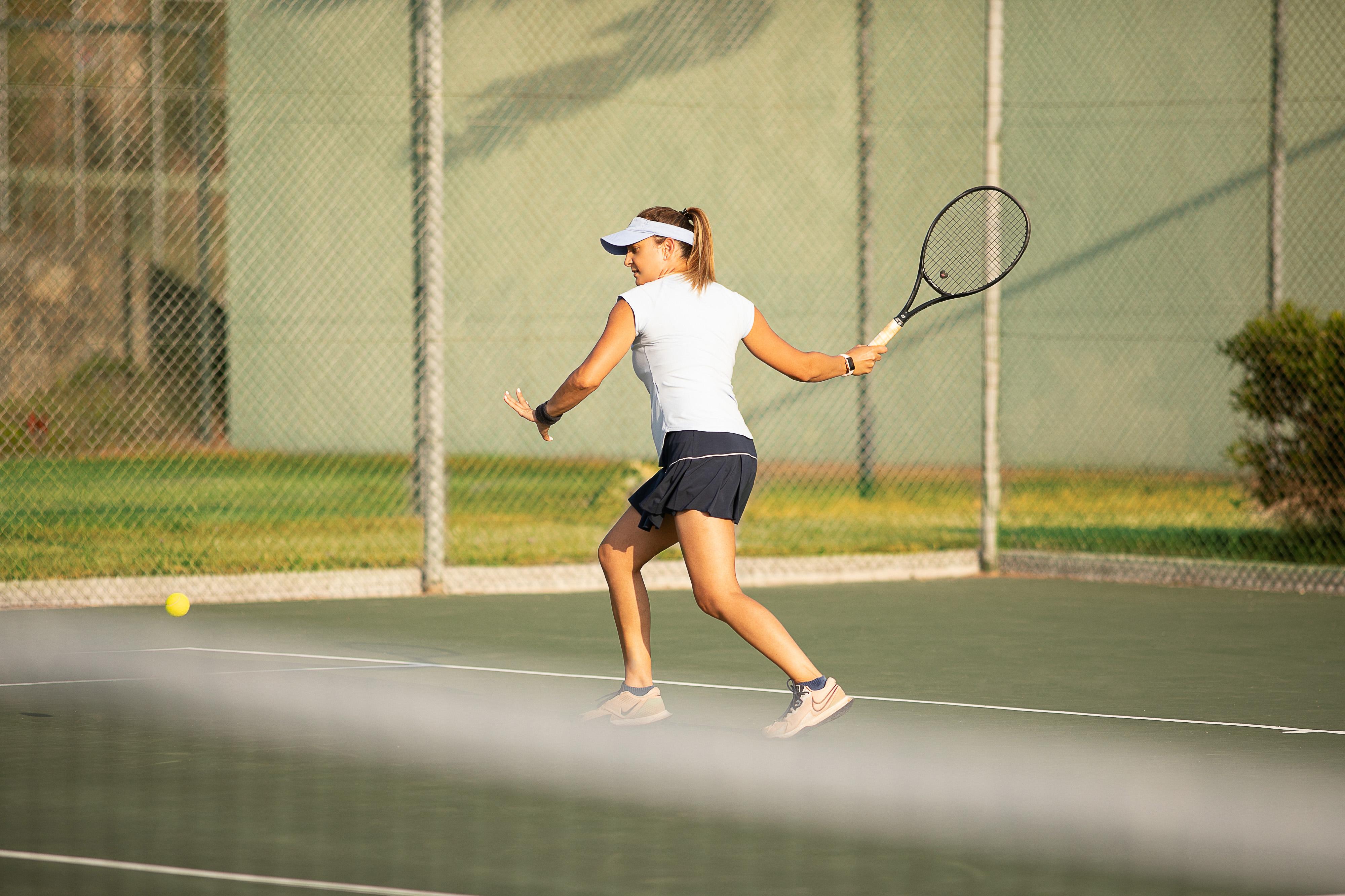 Porto Carras Meliton Hotel Neos Marmaras Exterior photo A player preparing to hit a backhand