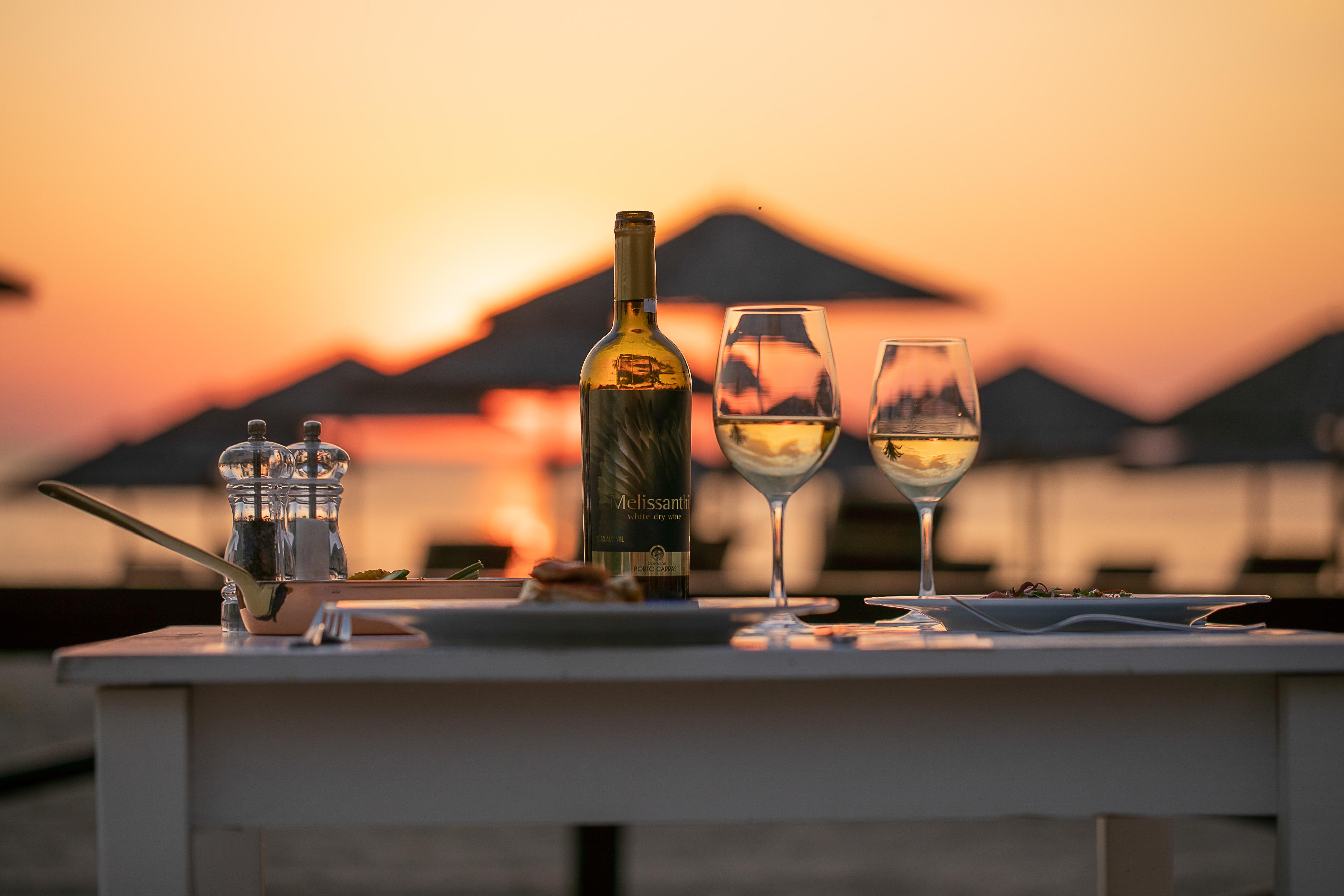 Porto Carras Meliton Hotel Neos Marmaras Exterior photo A bottle of wine